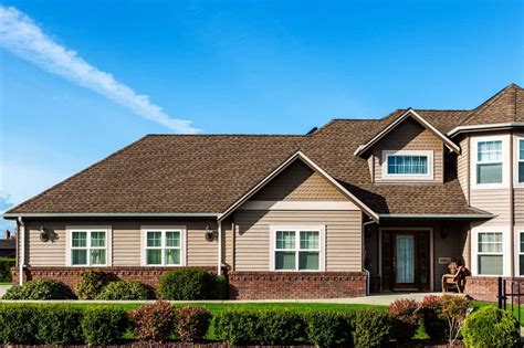 tan house with brown roof